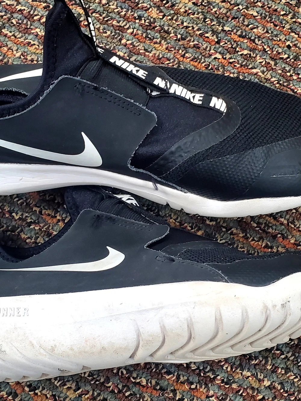 Nike Men’s Black and White Slip-On Athletic Sneakers